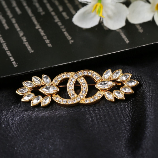 CL BROOCH
