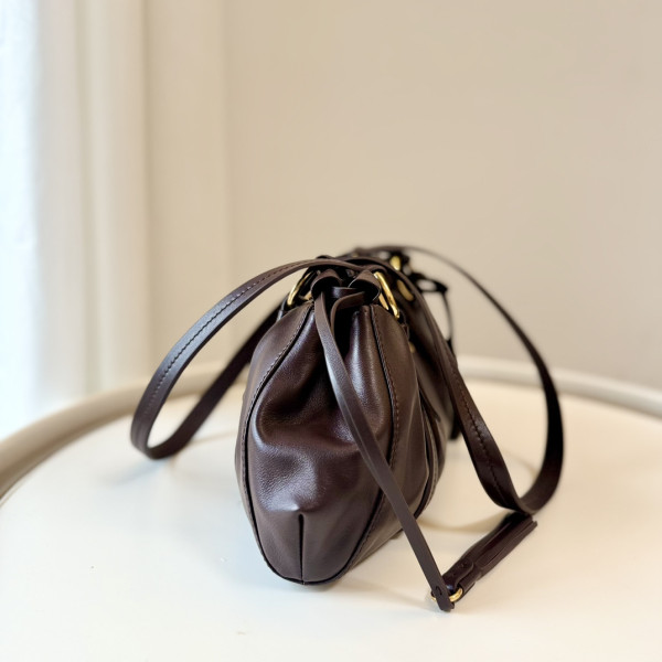 M*um*u joie nappa leather bag